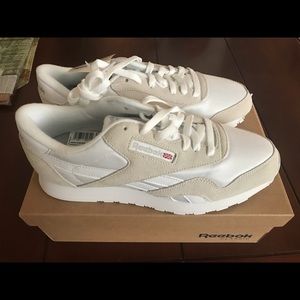 White and light grey reebok sneakers